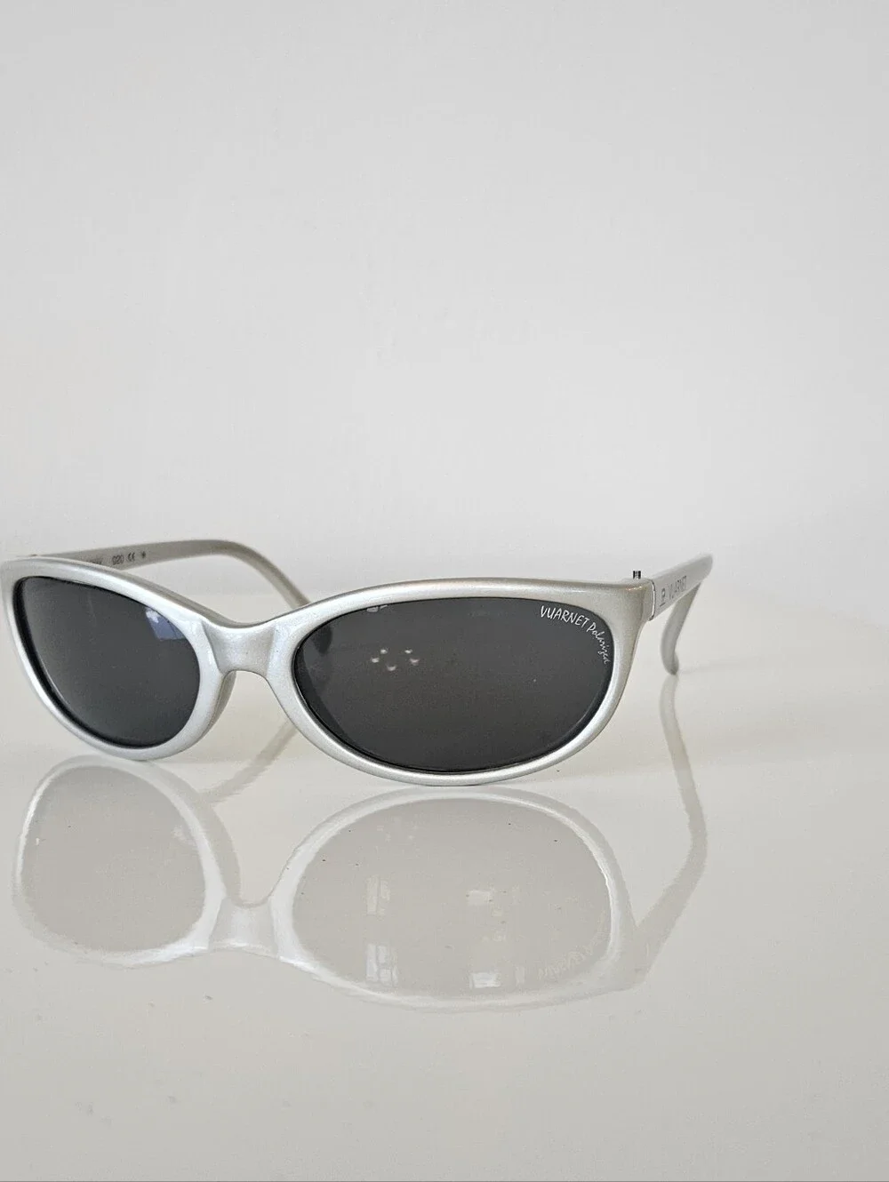 Vuarnet Silver Oval Sunglasses with Dark Lenses